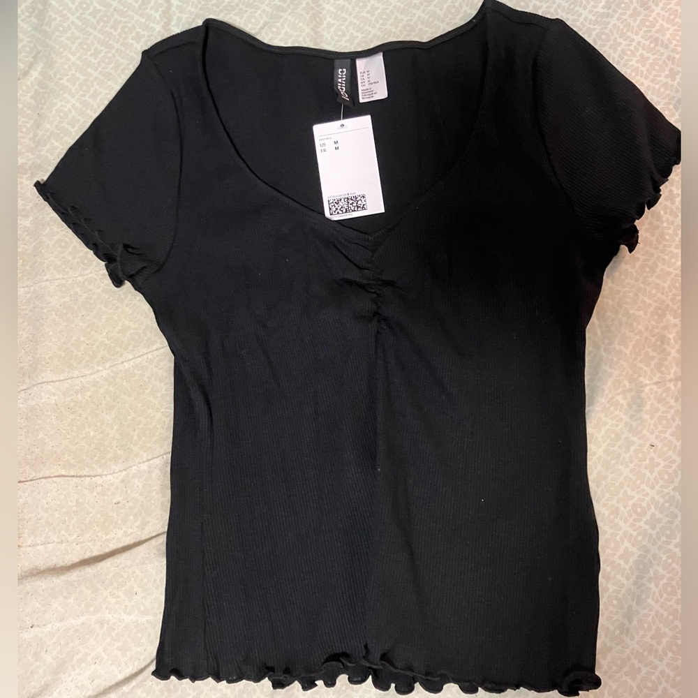 Black lettuce trim shirt